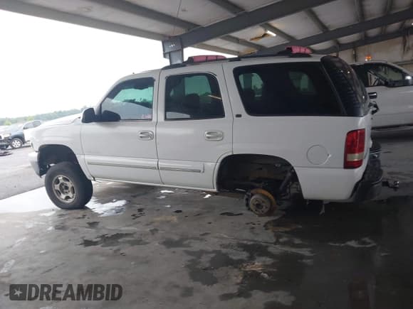 ✅ 2002 Chevrolet Tahoe LT • VIN: 1GNEC13Z92R235435 • Lot: 42764198. Listed on IAAI with 248,194 mi. Free auction sales archive from the USA and detailed vehicle history report at DreamBid. Image 13.