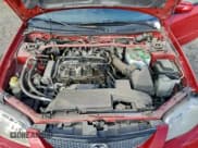 ✅ 2002 Mazda Protege • VIN: JM1BJ245521616264 • Lot: 95169045. Listed on Copart with 111,622 mi. Free auction sales archive from the USA and detailed vehicle history report at DreamBid. Image 11.