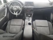 ✅ 2015 Mazda CX-5 Sport • VIN: JM3KE2BE8F0473515 • Лот: 86459275. Опубликован ранее на Copart с пробегом 140 890 миль. Бесплатный доступ к архиву аукционных продаж из США и подробный отчёт об истории автомобиля на DreamBid. Изображение 8.