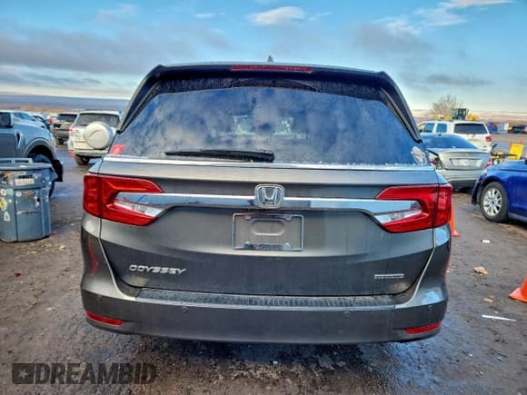 ✅ 2018 Honda Odyssey Touring • VIN: 5FNRL6H84JB005622 • Lot: 94671885. Wystawiony na Copart z przebiegiem 87 429 mil. Bezpłatny archiwum sprzedaży aukcyjnych z USA i szczegółowy raport historii pojazdu na DreamBid. Zdjęcie 6.