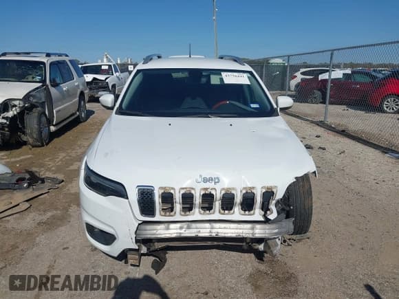 ✅ 2019 Jeep Cherokee Latitude Plus • VIN: 1C4PJLLBXKD411296 • Lot: 43756441. Listed on IAAI with 94,483 mi. Free auction sales archive from the USA and detailed vehicle history report at DreamBid. Image 12.