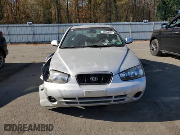 2001 Hyundai Elantra GLS z VIN KMHDN45D71U057338, wystawiony jako Copart lot #79084024 z przebiegiem 137 887 mil mil oraz Szkoda całkowita • Salvage title. Historia ofert i sprzedaży dostępna na DreamBid. Obrazek 5.