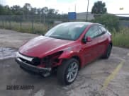 ✅ 2024 Tesla Model Y Long Range • VIN: 7SAYGDEEXRA245350 • Lot: 43416158. Listed on IAAI with Not provided. Free auction sales archive from the USA and detailed vehicle history report at DreamBid. Image 2.