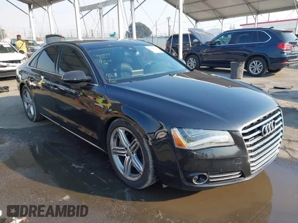 ✅ 2011 Audi A8 • VIN: WAUAVAFD6BN023937 • Lot: 41288464. Listed on IAAI with 158,127 mi. Free auction sales archive from the USA and detailed vehicle history report at DreamBid. Image 1.