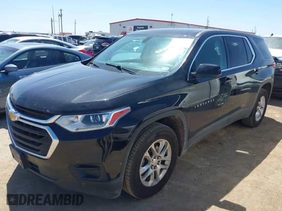 ✅ 2020 Chevrolet Traverse LS • VIN: 1GNERFKW9LJ209081 • Lot: 42870767. Listed on IAAI with 123,744 mi. Free auction sales archive from the USA and detailed vehicle history report at DreamBid. Image 2.
