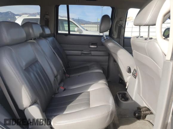 ✅ 2005 Dodge Durango Limited • VIN: 1D4HB58D15F574292 • Лот: 90293345. Опубликован ранее на Copart с пробегом 174 154 миль. Бесплатный доступ к архиву аукционных продаж из США и подробный отчёт об истории автомобиля на DreamBid. Изображение 11.