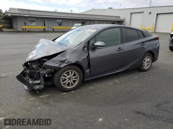 ✅ 2021 Toyota Prius LE • VIN: JTDKAMFU8M3139126 • Lot: 87396285. Listed on Copart with 243,893 mi. Free auction sales archive from the USA and detailed vehicle history report at DreamBid. Image 1.