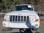 ✅ 2010 Jeep Commander Sport • VIN: 1J4RG4GK4AC106902 • Lot: 41314491. Listed on IAAI with 102,045 mi. Free auction sales archive from the USA and detailed vehicle history report at DreamBid. Image 12.