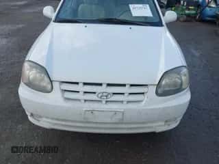 2004 Hyundai Accent GL z VIN KMHCG35C74U303431, wystawiony jako IAAI lot #41725717 z przebiegiem 211 893 mil mil oraz . Historia ofert i sprzedaży dostępna na DreamBid. Obrazek 6.