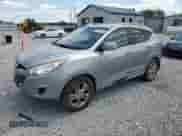 2011 Hyundai Tucson GLS z VIN KM8JUCAC5BU264860, wystawiony jako Copart lot #67168205 z przebiegiem 120 394 mil mil oraz Szkoda całkowita • Salvage title. Historia ofert i sprzedaży dostępna na DreamBid. Obrazek 1.