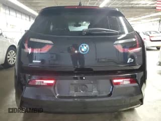 ✅ 2014 BMW i3 • VIN: WBY1Z4C59EV275996 • Лот: 90506945. Опубликован ранее на Copart с пробегом 57 168 миль. Бесплатный доступ к архиву аукционных продаж из США и подробный отчёт об истории автомобиля на DreamBid. Изображение 6.