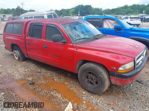 ✅ 2000 Dodge Dakota Sport • VIN: 1B7GL2AN7YS607119 • Лот: 42377808. Размещён на IAAI с пробегом 287 892 миль миль. Получите бесплатный доступ к архиву аукционных продаж из США и посмотрите подробный отчёт об истории автомобиля на DreamBid. Изображение 1.