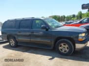 ✅ 2004 Chevrolet Suburban LT • VIN: 1GNEC16Z04J163697 • Lot: 42267114. Listed on IAAI with 245,186 mi. Free auction sales archive from the USA and detailed vehicle history report at DreamBid. Image 13.