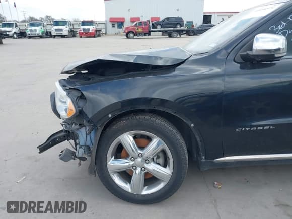 ✅ 2013 Dodge Durango Citadel • VIN: 1C4RDHEG5DC504757 • Lot: 41696972. Listed on IAAI with 133,049 mi. Free auction sales archive from the USA and detailed vehicle history report at DreamBid. Image 20.