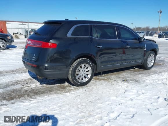 ✅ 2013 Lincoln MKT • VIN: 2LMHJ5NK8DBL51461 • Lot: 41554302. Listed on IAAI with 150,931 mi. Free auction sales archive from the USA and detailed vehicle history report at DreamBid. Image 4.