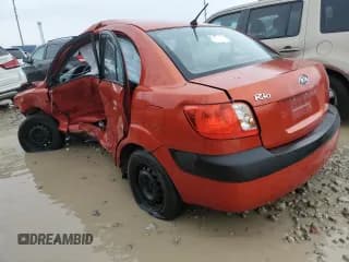 ✅ 2006 Kia Rio • VIN: KNADE123166070450 • Lot: 39369374. Listed on Copart with Not provided. Free auction sales archive from the USA and detailed vehicle history report at DreamBid. Image 2.