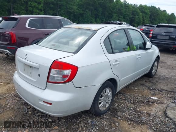 ✅ 2013 Suzuki SX4 LE • VIN: JS2YC5A38D6100341 • Лот: 42700979. Опубликован ранее на IAAI с пробегом 108 922 миль. Бесплатный доступ к архиву аукционных продаж из США и подробный отчёт об истории автомобиля на DreamBid. Изображение 4.
