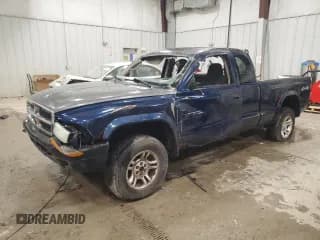 ✅ 2003 Dodge Dakota Sport • VIN: 1D7HG32N43S328884 • Lot: 85985644. Wystawiony na Copart z przebiegiem 141 779 mil. Bezpłatny archiwum sprzedaży aukcyjnych z USA i szczegółowy raport historii pojazdu na DreamBid. Zdjęcie 1.