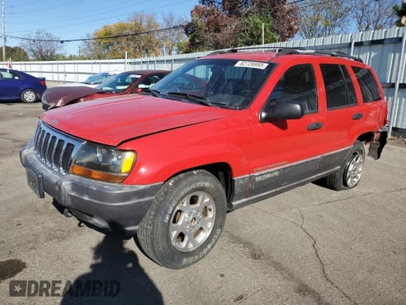 ✅ 2000 Jeep Grand Cherokee Laredo • VIN: 1J4GW48S1YC214915 • Lot: 82728995. Listed on Copart with 111,305 mi. Free auction sales archive from the USA and detailed vehicle history report at DreamBid. Image 1.