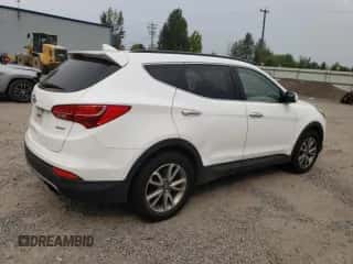 2014 Hyundai Santa Fe z VIN 5XYZU3LA9EG125162, wystawiony jako Copart lot #71719155 z przebiegiem 97 306 mil mil oraz Czysty tytuł • Clean title. Historia ofert i sprzedaży dostępna na DreamBid. Obrazek 3.