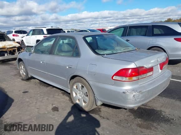2002 Honda Accord EX с VIN 1HGCG16512A028146, выставлен на аукционе IAAI как лот 43554658 с пробегом 141 372 миль миль и . История ставок и продаж доступна на DreamBid. Изображение 3.