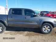 ✅ 2013 Toyota Tacoma PreRunner • VIN: 5TFJU4GN2DX039199 • Lot: 40882464. Listed on IAAI with 286,278 mi. Free auction sales archive from the USA and detailed vehicle history report at DreamBid. Image 13.