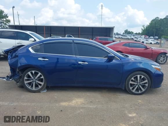 ✅ 2016 Nissan Altima SL • VIN: 1N4BL3AP1GC249063 • Lot: 42394749. Listed on IAAI with 64,911 mi. Free auction sales archive from the USA and detailed vehicle history report at DreamBid. Image 13.