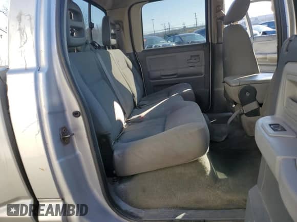 2006 Dodge Dakota SLT с VIN 1D7HE48KX6S505693, выставлен на аукционе Copart как лот 80316214 с пробегом 221 637 миль миль и Списание • Salvage title. История ставок и продаж доступна на DreamBid. Изображение 10.