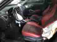 2014 Hyundai Veloster z VIN KMHTC6AD2EU208868, wystawiony jako Copart lot #65717864 z przebiegiem 150 225 mil mil oraz Szkoda całkowita • Salvage title. Historia ofert i sprzedaży dostępna na DreamBid. Obrazek 7.