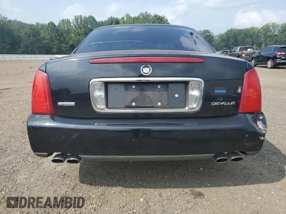 ✅ 2004 Cadillac DeVille • VIN: 1G6KD54Y04U118044 • Lot: 68175425. Listed on Copart with 311,751 mi. Free auction sales archive from the USA and detailed vehicle history report at DreamBid. Image 6.