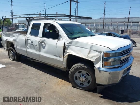 ✅ 2015 Chevrolet Silverado 2500HD Work Truck • VIN: 1GC2CUEGXFZ105548 • Lot: 42816741. Listed on IAAI with 249,611 mi. Free auction sales archive from the USA and detailed vehicle history report at DreamBid. Image 1.