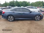 ✅ 2018 Honda Civic EX-T • VIN: JHMFC1F34JX037438 • Lot: 42887459. Listed on IAAI with 107,302 mi. Free auction sales archive from the USA and detailed vehicle history report at DreamBid. Image 13.