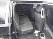 2018 Chevrolet Suburban LS z VIN 1GNSKGKCXJR264351, wystawiony jako IAAI lot #42365399 z przebiegiem 69 704 mil mil oraz . Historia ofert i sprzedaży dostępna na DreamBid. Obrazek 8.