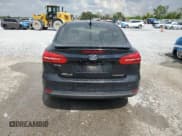 ✅ 2017 Ford Focus Titanium • VIN: 1FADP3J21HL207060 • Lot: 69495275. Wystawiony na Copart z przebiegiem 100 856 mil. Bezpłatny archiwum sprzedaży aukcyjnych z USA i szczegółowy raport historii pojazdu na DreamBid. Zdjęcie 6.