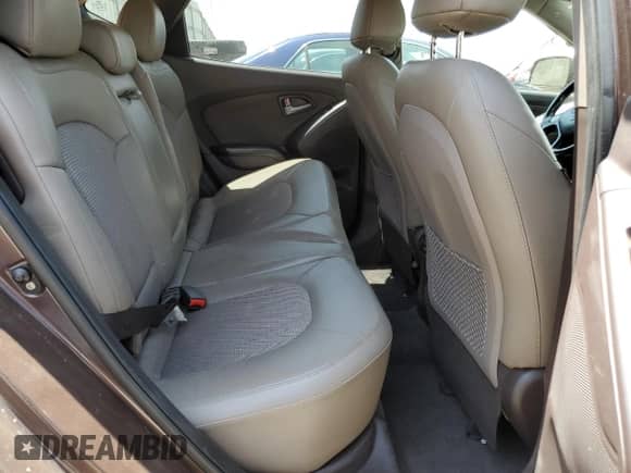 2014 Hyundai Tucson SE z VIN KM8JUCAG3EU813348, wystawiony jako Copart lot #61235045 z przebiegiem 77 597 mil mil oraz Szkoda całkowita • Salvage title. Historia ofert i sprzedaży dostępna na DreamBid. Obrazek 10.