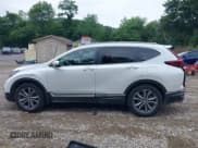 ✅ 2021 Honda CR-V Touring • VIN: 7FARW2H98ME007794 • Lot: 42695112. Listed on IAAI with 61,804 mi. Free auction sales archive from the USA and detailed vehicle history report at DreamBid. Image 14.