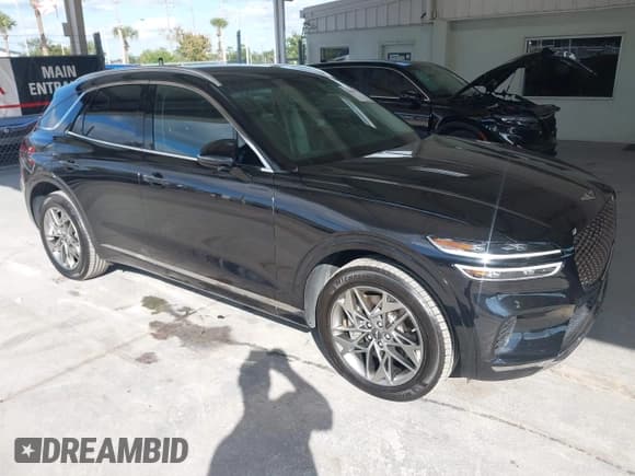 ✅ 2025 Genesis GV70 2.5T • VIN: KMUMADTB4SU200052 • Лот: 43630973. Опубликован ранее на IAAI с пробегом 18 321 миль. Бесплатный доступ к архиву аукционных продаж из США и подробный отчёт об истории автомобиля на DreamBid. Изображение 1.