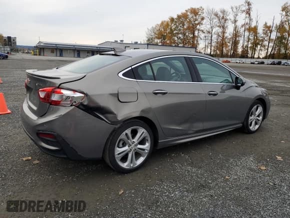 ✅ 2017 Chevrolet Cruze Premier • VIN: 1G1BF5SM9H7206904 • Лот: 91249745. Опубликован ранее на Copart с пробегом 64 345 миль. Бесплатный доступ к архиву аукционных продаж из США и подробный отчёт об истории автомобиля на DreamBid. Изображение 3.