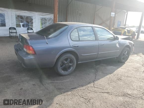 ✅ 1999 Nissan Maxima GXE • VIN: JN1CA21D8XT803822 • Lot: 64638365. Wystawiony na Copart z przebiegiem 203 700 mil. Bezpłatny archiwum sprzedaży aukcyjnych z USA i szczegółowy raport historii pojazdu na DreamBid. Zdjęcie 3.