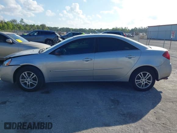 ✅ 2006 Pontiac G6 1SV • VIN: 1G2ZF55B164187364 • Lot: 43781393. Listed on IAAI with 87,882 mi. Free auction sales archive from the USA and detailed vehicle history report at DreamBid. Image 14.