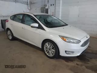 ✅ 2016 Ford Focus Titanium • VIN: 1FADP3N26GL321290 • Lot: 43827807. Listed on IAAI with 156,061 mi. Free auction sales archive from the USA and detailed vehicle history report at DreamBid. Image 1.