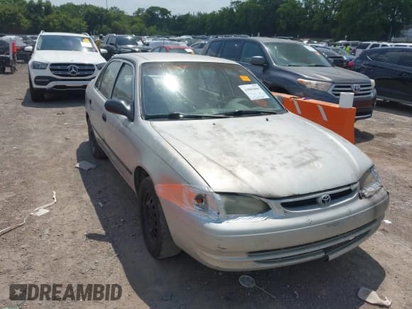 ✅ 1999 Toyota Corolla VE • VIN: 1NXBR12E2XZ214726 • Lot: 43005806. Listed on IAAI with 295,368 mi. Free auction sales archive from the USA and detailed vehicle history report at DreamBid. Image 14.
