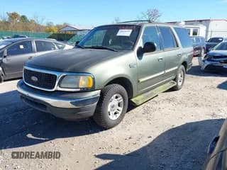 ✅ 2001 Ford Expedition XLT • VIN: 1FMRU15W91LA85477 • Lot: 43616059. Wystawiony na IAAI z przebiegiem 123 659 mil. Bezpłatny archiwum sprzedaży aukcyjnych z USA i szczegółowy raport historii pojazdu na DreamBid. Zdjęcie 2.
