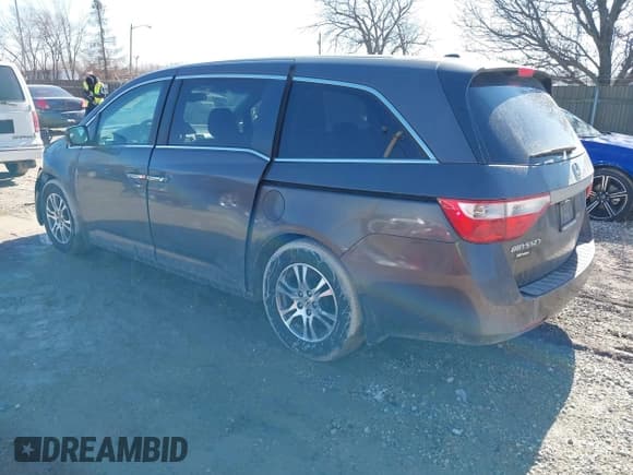 ✅ 2012 Honda Odyssey EX-L • VIN: 5FNRL5H61CB095761 • Lot: 41647368. Listed on IAAI with 146,661 mi. Free auction sales archive from the USA and detailed vehicle history report at DreamBid. Image 3.