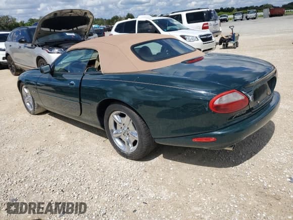 ✅ 1997 Jaguar XK • VIN: SAJGX274XVC013134 • Лот: 73891734. Опубликован ранее на Copart с пробегом Не указан. Бесплатный доступ к архиву аукционных продаж из США и подробный отчёт об истории автомобиля на DreamBid. Изображение 2.