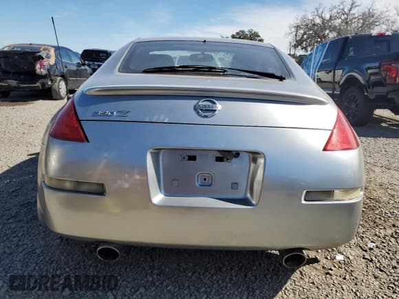 ✅ 2003 Nissan 350Z Touring • VIN: JN1AZ34E33T003854 • Lot: 91956575. Wystawiony na Copart z przebiegiem 91 238 mil. Bezpłatny archiwum sprzedaży aukcyjnych z USA i szczegółowy raport historii pojazdu na DreamBid. Zdjęcie 6.