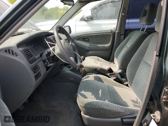 ✅ 2003 Suzuki Vitara JLX • VIN: 2S3TD52V136101732 • Лот: 58477845. Опубликован ранее на Copart с пробегом 105 628 миль. Бесплатный доступ к архиву аукционных продаж из США и подробный отчёт об истории автомобиля на DreamBid. Изображение 7.