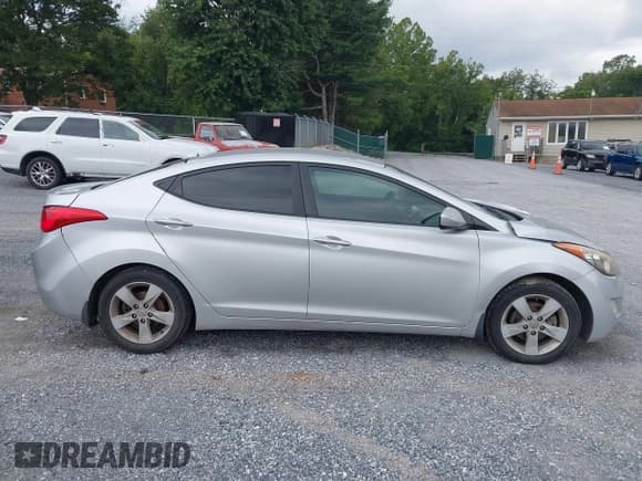 ✅ 2013 Hyundai Elantra GLS • VIN: KMHDH4AE8DU829579 • Lot: 42940329. Listed on IAAI with 153,115 mi. Free auction sales archive from the USA and detailed vehicle history report at DreamBid. Image 14.