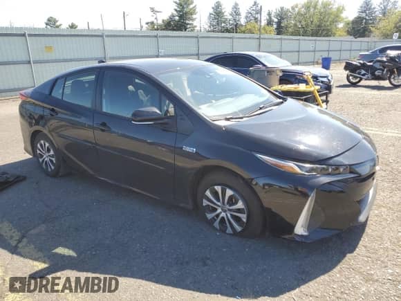 2021 Toyota Prius LE с VIN JTDKAMFP9M3170900, выставлен на аукционе Copart как лот 84271525 с пробегом 24 578 миль миль и Списание • Salvage title. История ставок и продаж доступна на DreamBid. Изображение 4.