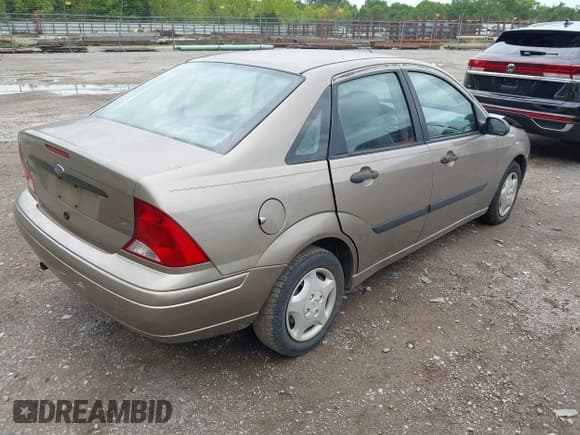 ✅ 2003 Ford Focus LX • VIN: 1FAFP33PX3W167800 • Lot: 42937412. Listed on IAAI with 112,556 mi. Free auction sales archive from the USA and detailed vehicle history report at DreamBid. Image 4.